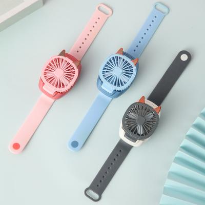 China USB Rechargeable Bladeless Watch Fan In Hand Small With Hand Strap Portable Mini Fan Watch Animal Cartoon Comfortable Colorful for sale