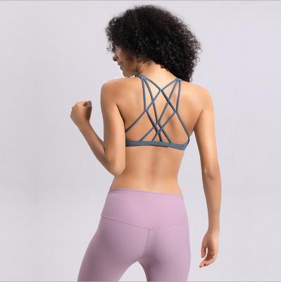 China Women Breathable High Print Criss-Cross Upper Strappy Back Activewear Yoga Bra Sports Fitness Bra Basic Bra for sale