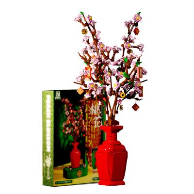 China The Building Block Toy QIZHILE 92021 Simulated Peach Blossom Flower Building Block 992pcs DIY Flower Bouquet For Home Decoration Bricks for sale