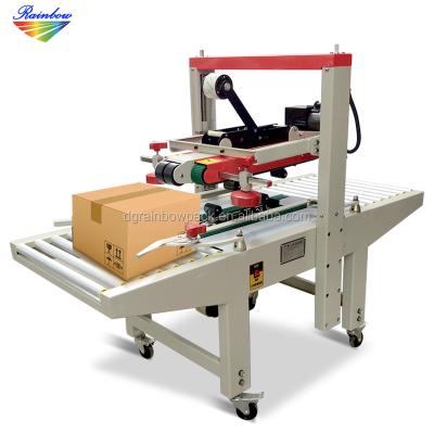 China Automatic Beverage Factory Price Adhesive Tape Carton Box Sealing Machine for sale