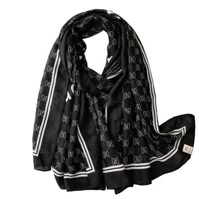 China Wholesale fashion lightweight polyester brand black letter printing sunscreen scarf imitation shawl for sale