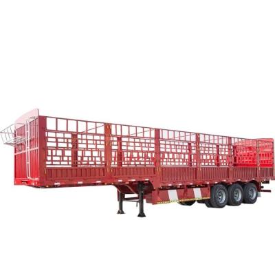 中国 50トンの乾貨物 重荷卸荷用 ステーク閉塞トレーラーフェンス用 半トレーラー 販売のため