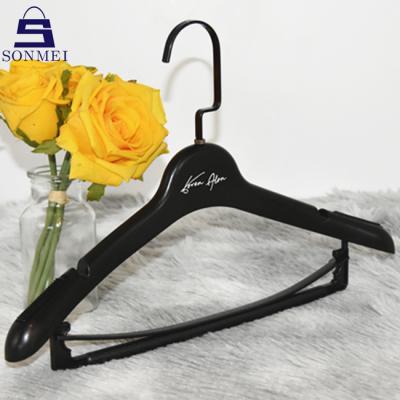 China Durable Black Square Plastic Hook Garment Clothes Lady Hangers For Suit for sale