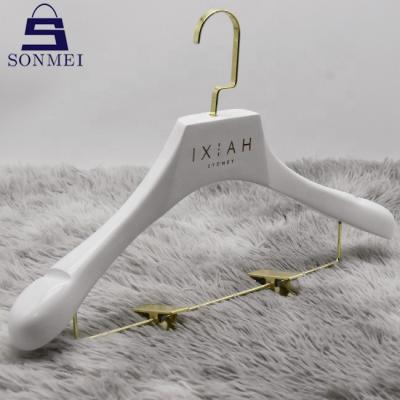 China New Large Classic/Postmodern Wedding Dress Hanger For Skirts White Wooden Hanger With Clips for sale