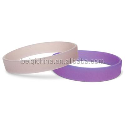 China UV printed silicone wristbands, change the transparent wristband to be purple or blue under the sun for sale