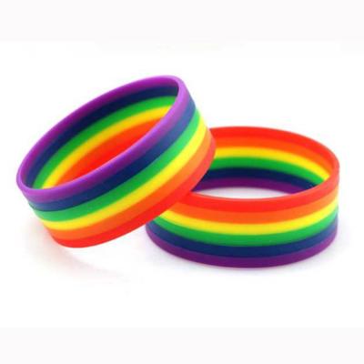 China Printed Customized Logo Support LGBT Rainbow Silicone Wristband for sale