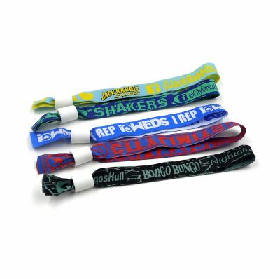 China Custom jacquard woven polyester fabric wristbands from Europe with plastic clip, personalized fabric wristbands, fabric wristbands with logo for sale