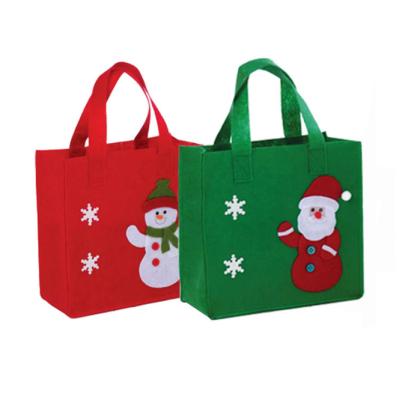 China 2021 New Hot Selling Christmas Fashion Santa Felt Reusable Tote Bag Woman Shopping Bag Handle Bag For Christmas Gift for sale