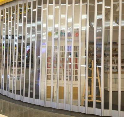 China Factory Security Shop Folding Accordion Polycarbonate PVC Commercial Folding Door for sale