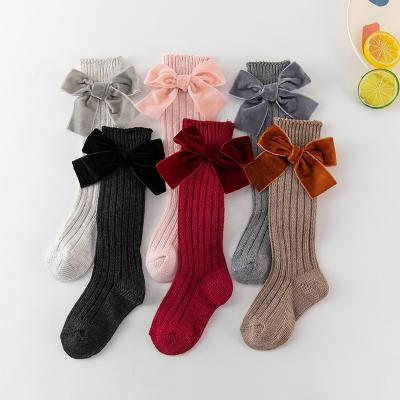 China Wholesale Sporty Kids Spanish Sweet Girl Booties Knitted Cotton Red Color Knee Thigh Highs Baby Bow Booties With Bow for sale