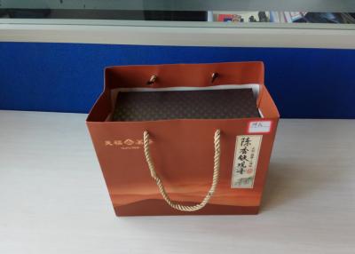 China Custom Kraft Paper Shopping Bags With Handles Letterpress Printing 16.2g for sale