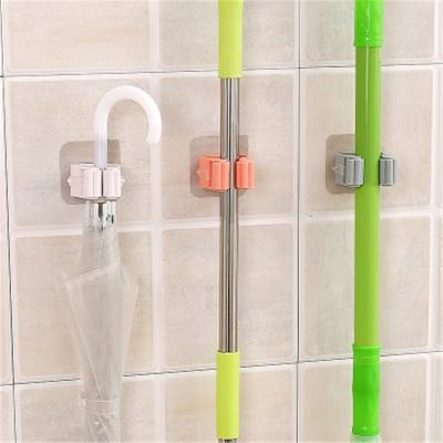 China Wall Mounted Organizer Bathroom Accessories Hook Household Kitchen Organizer Shelf Hanger Rack Bathroom Mop Rack Holder for sale