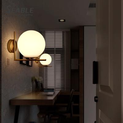 China Restaurant Gold Decoration Bedroom Study Room Modern Glass Listed Contemporary Indoor Modern LED Metal Wall Lamp for sale