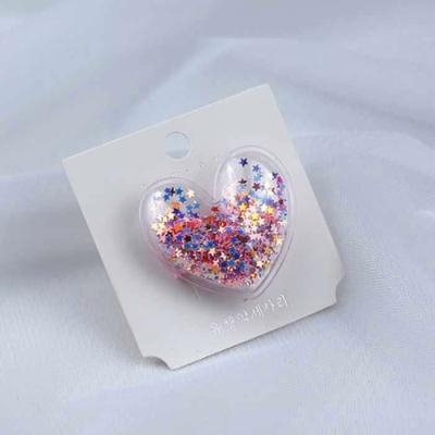 China Hot Professional Custom Love Flake Quicksand Sequin PVC Clip Crocodile Clip For Kid 5*5cm for sale