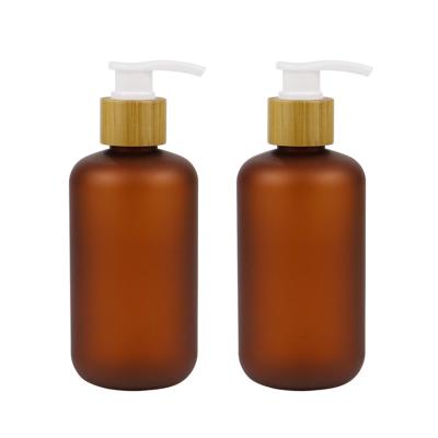 China Personal Care PET Bamboo Lotion Cream Packaging Cosmetic Jar Amber Frosted Plastic Bottle for sale