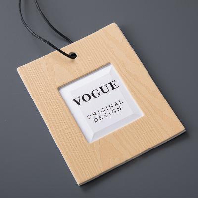 China Viable popular new design custom apparel hang tag 	Paper Hang Tag Customized Hangtag for sale