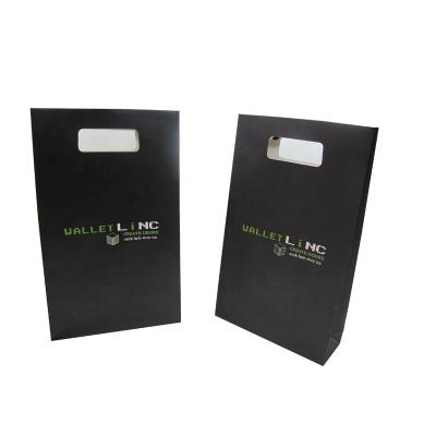 China Recyclable Custom Die Cut Handle Clothes Paper Bags Boutique Gift Shopping Bags for sale