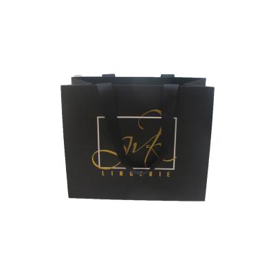 China Recyclable Custom Factory Business Paper Bag Paper Bag Black And Gold Stamping Fashionable Shopping Logo for sale