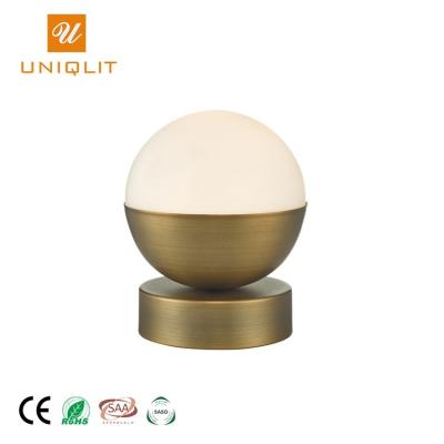 China Modern Innovative New Products Color Lamination Spherical Brass Iron Glass Table Lamp for sale