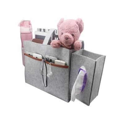 China Viable New Design Convenient Bed Sofa Desk Hanging Caddy Organizer Felt Bedside Storage Bag With Pockets for sale