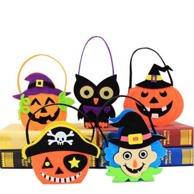 China Holiday Decorations New Arrivals Halloween Trick Or Treat Felt Candy Tote Bag Felt Halloween Pumpkin Bag For Kids for sale