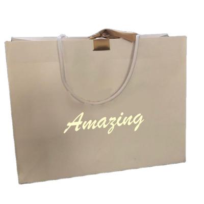 China Recyclable Economical Custom Products Reusable Paperbag Men's Clothing Packaging Paper Bag With Logo for sale