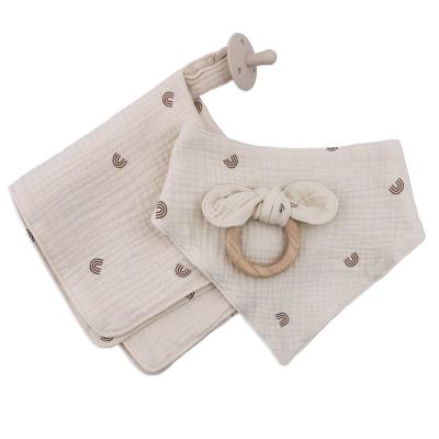 China Wooden Cotton Ring Teether Breathable Soft Muslin Bib Soft Toy Promotion Christmas Baby Gift Set Other Baby Supplies With Pacifier for sale