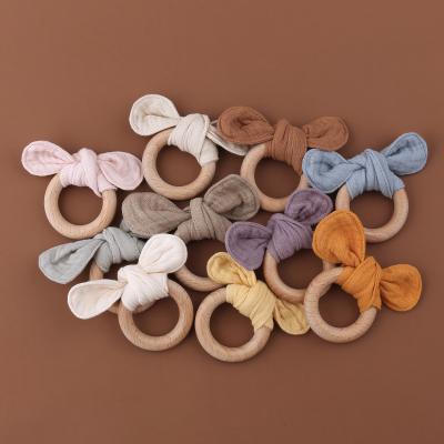 China NEW ARRIVAL Soft Toy TEETHER WOODEN RING FOR BABY WITH RABBIT EAR baby pacifier ring OEM/ODM teether for sale