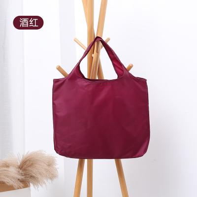 China Handled Hot selling eco friendly oxford fabric sustainable waterproof folding storage shopping bags wholesale suitable for household use for sale