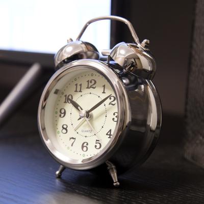 China Retro Simplicity Modern Popular Modern Fashion Around Luminous Students Mini Alarm Clocks Children Silver Metal Night Light Indicator for sale