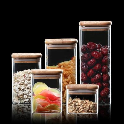 China Freshness Preservation 200/400/600/800/1200/2000ml Handblown Food Grade Airtight Glass Canister With Lids Kitchen Storage Bamboo Canisters Glass Jar for sale