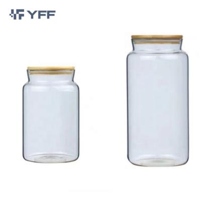 China Best Freshness Preservation 4oz Cheap Airtight Cylinder Food Candy 4 oz Small Mini Container Storage Glass Jars With Wood Top Lid for sale