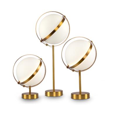 China Decorative Simple Modern Matt Gold Metal Round Ball Table Lamp for Hotel Cafe Living Room Bedroom Office Light for sale