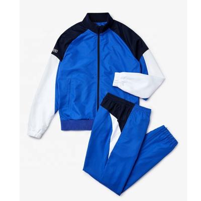 China OEM Colorblock Bodybuilding Sweatsuit Breathable Zipper Jogging Tracksuit Men Jogger Jogger Tracksuit for sale