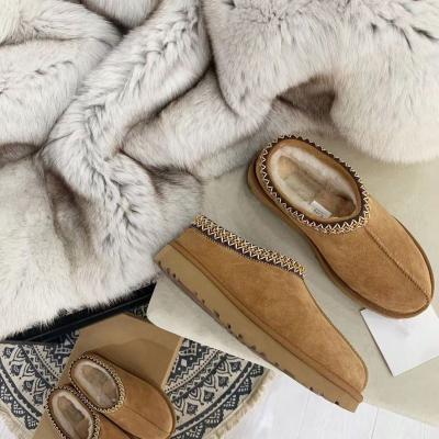 China Other Custom Thick Bottom Ethnic Color Half Wind Slippers Collision Thick Bottom Ethnic Color Unisex Warm Sheepskin Roll Weave Snow Boots for sale