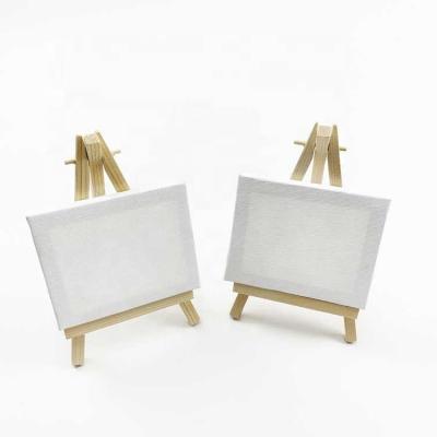 China Mini Small Easel Kids Artist Acrylic Table Top Easel Wooden Painting Drawing Easel Canvas Painting With Canvas for sale