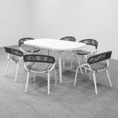 China Weather Resistant Garden Furniture Set Dining Table And Chair Modern Rope Dining Set for sale