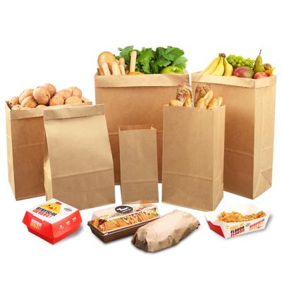 China Custom New Design Gift Brown Kraft Paper Bag Bolsas De Papel Craft Biodegradable Paper Shopping Bag Without Handle for sale