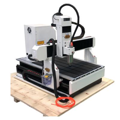 China Small desktop wood 3d cnc router 6090 6012 and mini aluminum engraving machine for sale