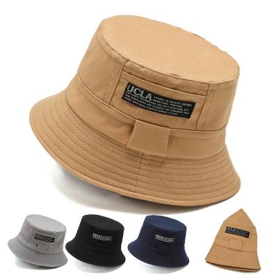 China Character design bucket hats custom double sided bucket hat fisherman hats with custom logo fifties hats for men hat for sale