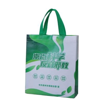 China Free PP Cartoon Design Of Nonwoven Bags Customized Training Handbag Education Institutions Advertising Customized Bags Printed Word Logo for sale