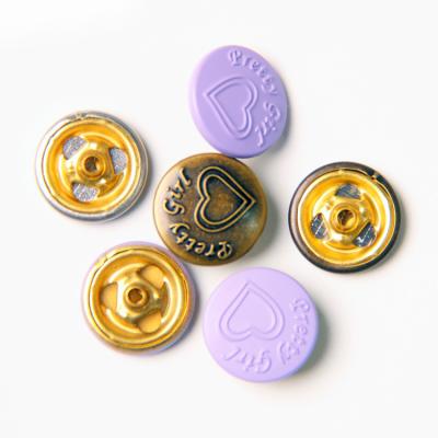 China Viable New OEM Custom Design Engraved Heart Shape Logo Brass Metal Spring Press Snap Button For Clothes for sale