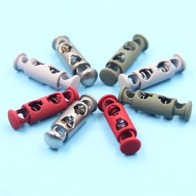 China Nickel Free Custom Painted Metal Two Key Stopper End Double Hole Spring Rope Lock for sale