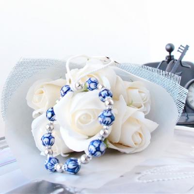 China Romantic Romantic Flower Beads Jewelry Beaded Bracelets Cuff For Kids For Young Lady Natural Ceramics Gift For Children's Day for sale