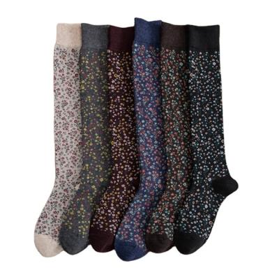 China Cheap wholesale sporty women flower long tube thongs floral knee high socks for women for sale