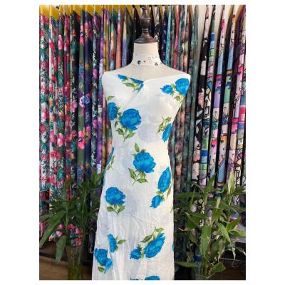 China Other High Quality Custom Wholesale Blue Rose Flower In Well Stretch Bubble Fabric For Women's Dress for sale