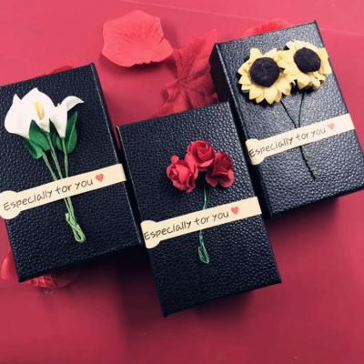 China Recyclable Recyclable Elegant Custom Design Flower Bottom Lid And Cardboard For Perfume Essential Oil Paper Gift Box for sale