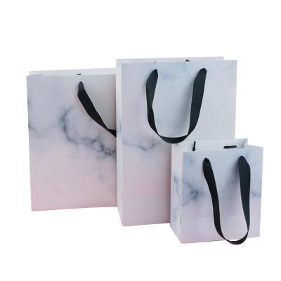 China Recyclable Luxury Custom Logo Rose Gold Gift Packaging Marble Hot Stamping Paper Bag for sale