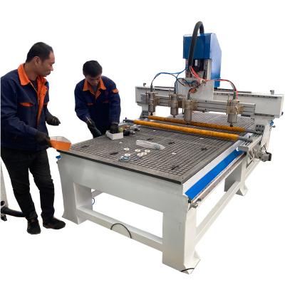 China Advertising company 1325 cnc stone wood router with DSP controller /cheap price 4 axis 3d cnc router machine with rotary for furniture legs for sale