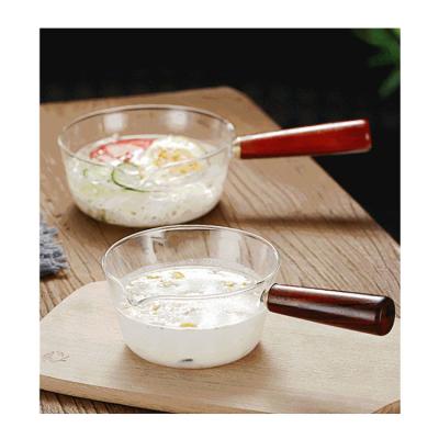 China China Sustainable Manufacturer Factory Price Heat Resistant Glass Pot Cooking With Wooden Handles for sale